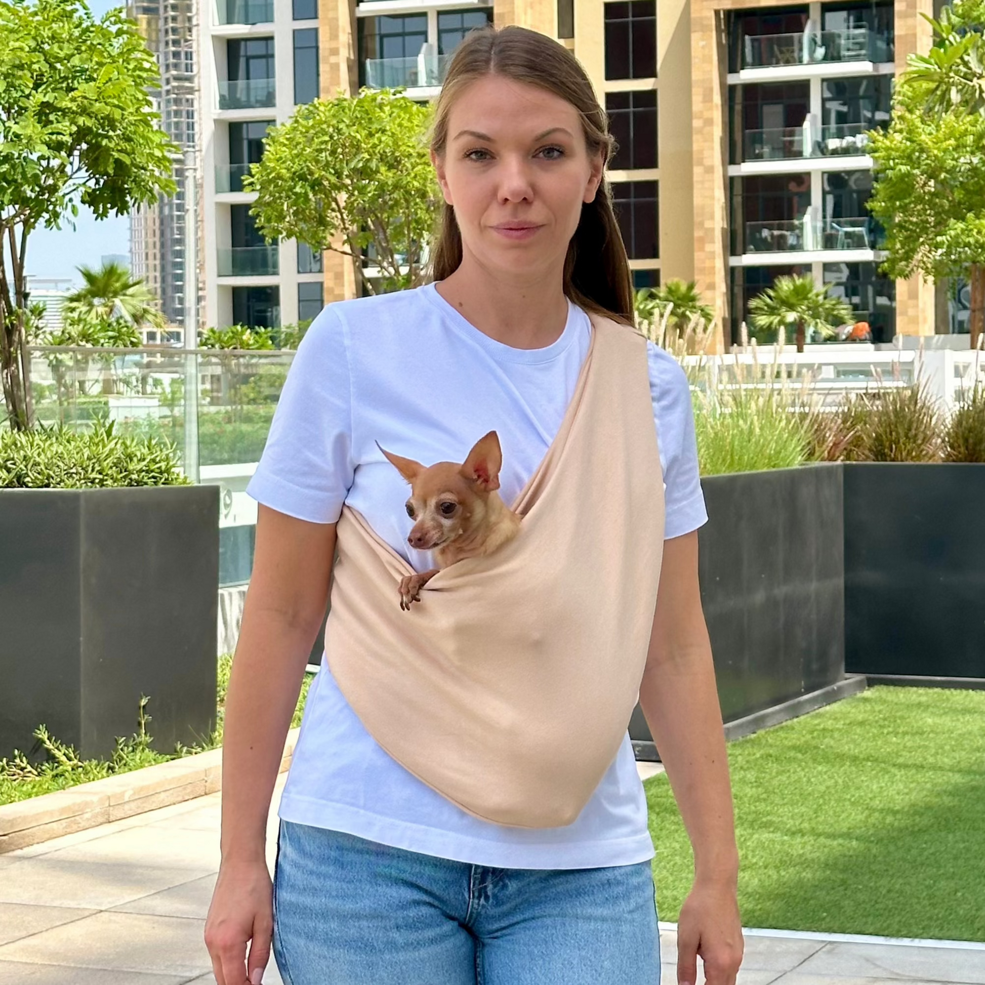 Small dog in beige cotton sling carrier – lightweight hands-free dog bag